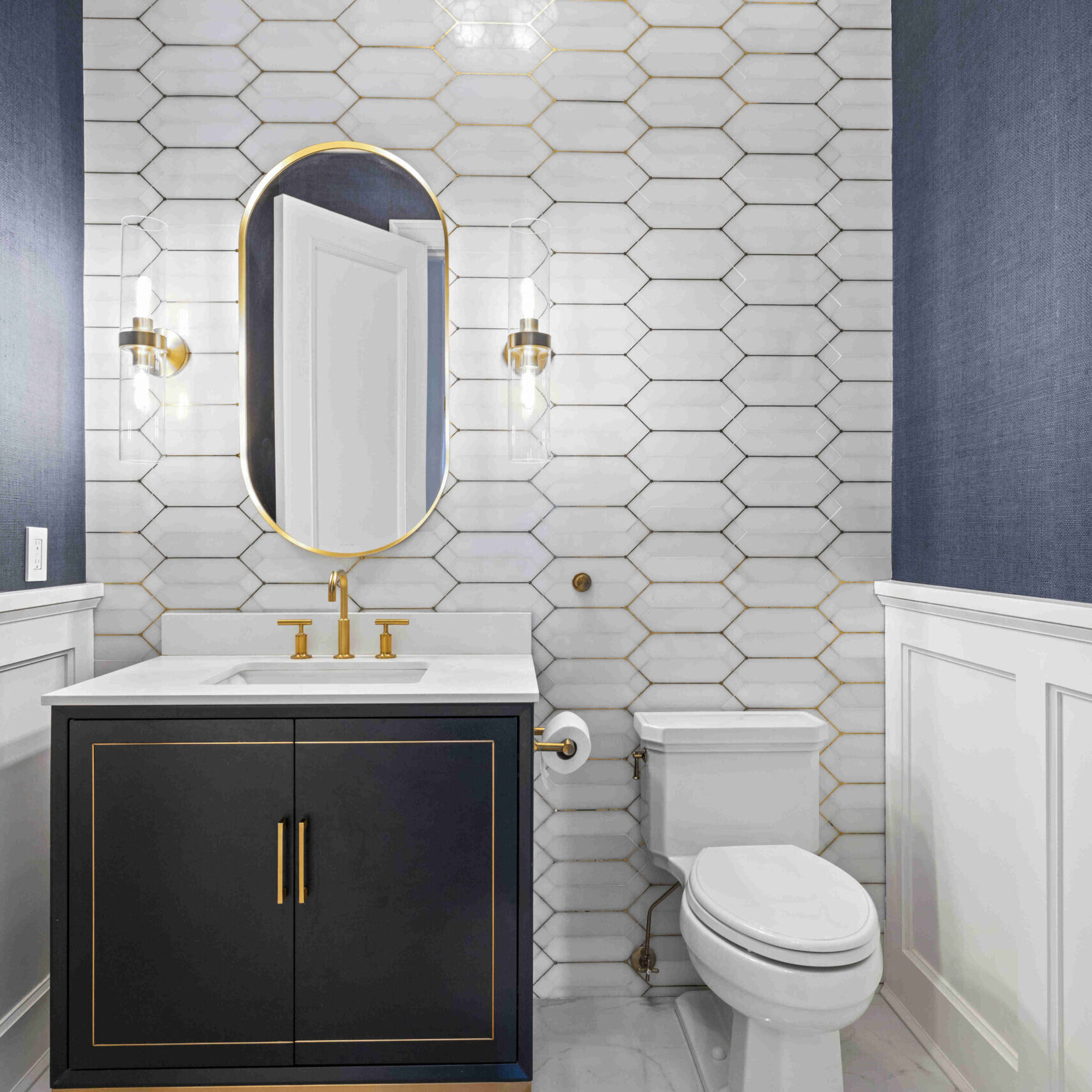 renovated-bathroom-with-gold-accents